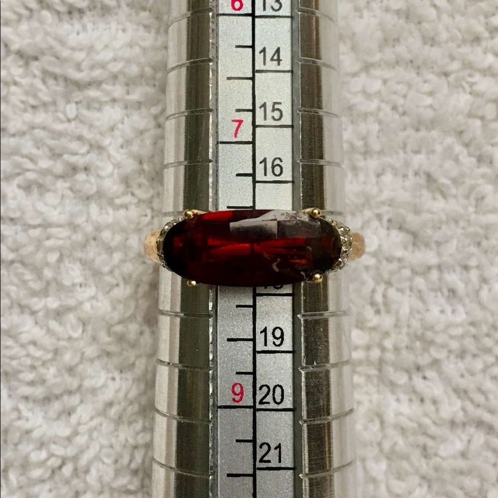Garnet stone in Gold over silver and Diamonaire